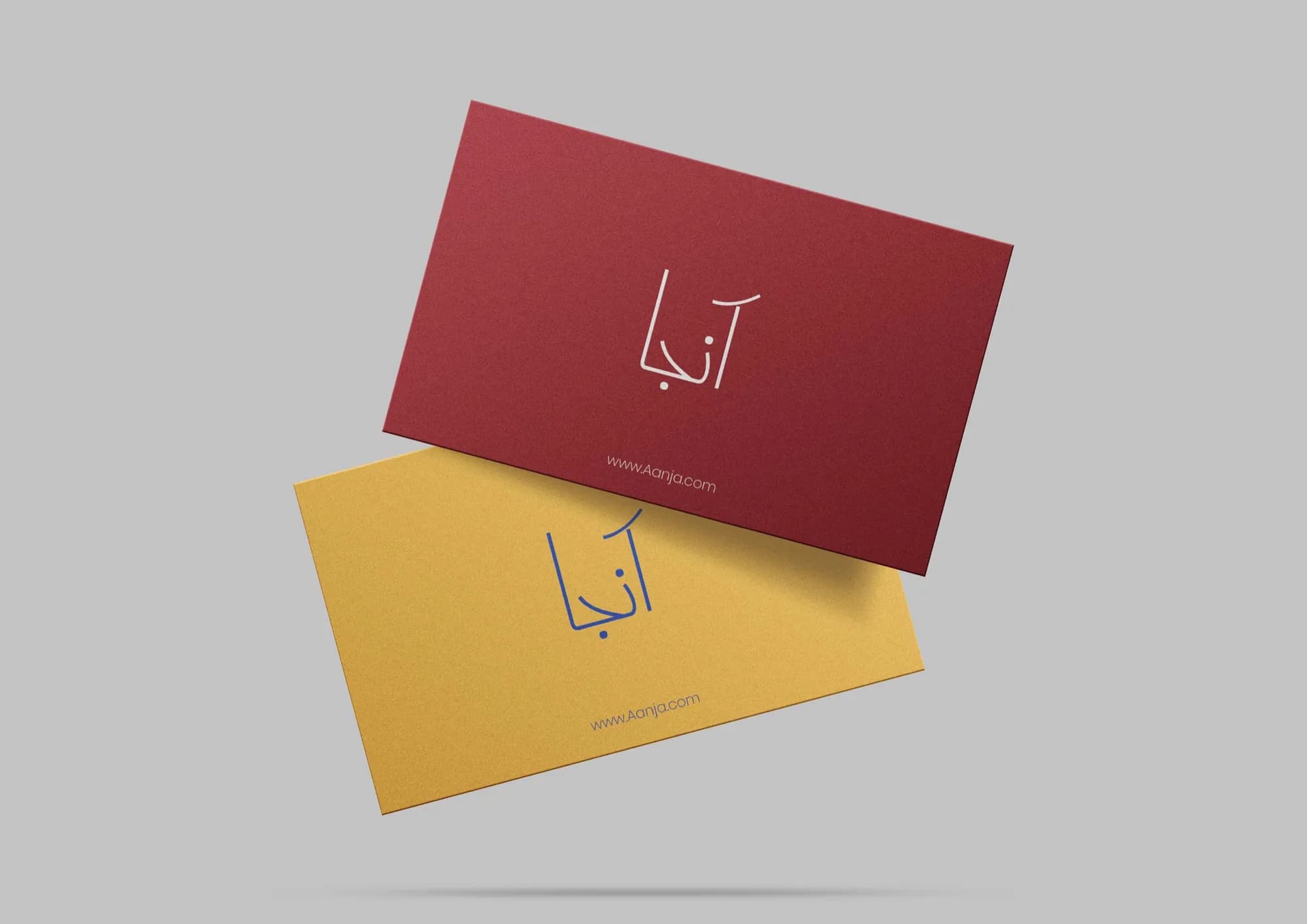 Aanja business cards in deep red and marigold