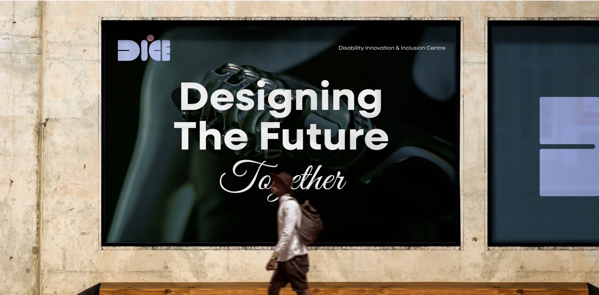 A DIICE billboard reading “Designing the Future Together” beside a passer-by