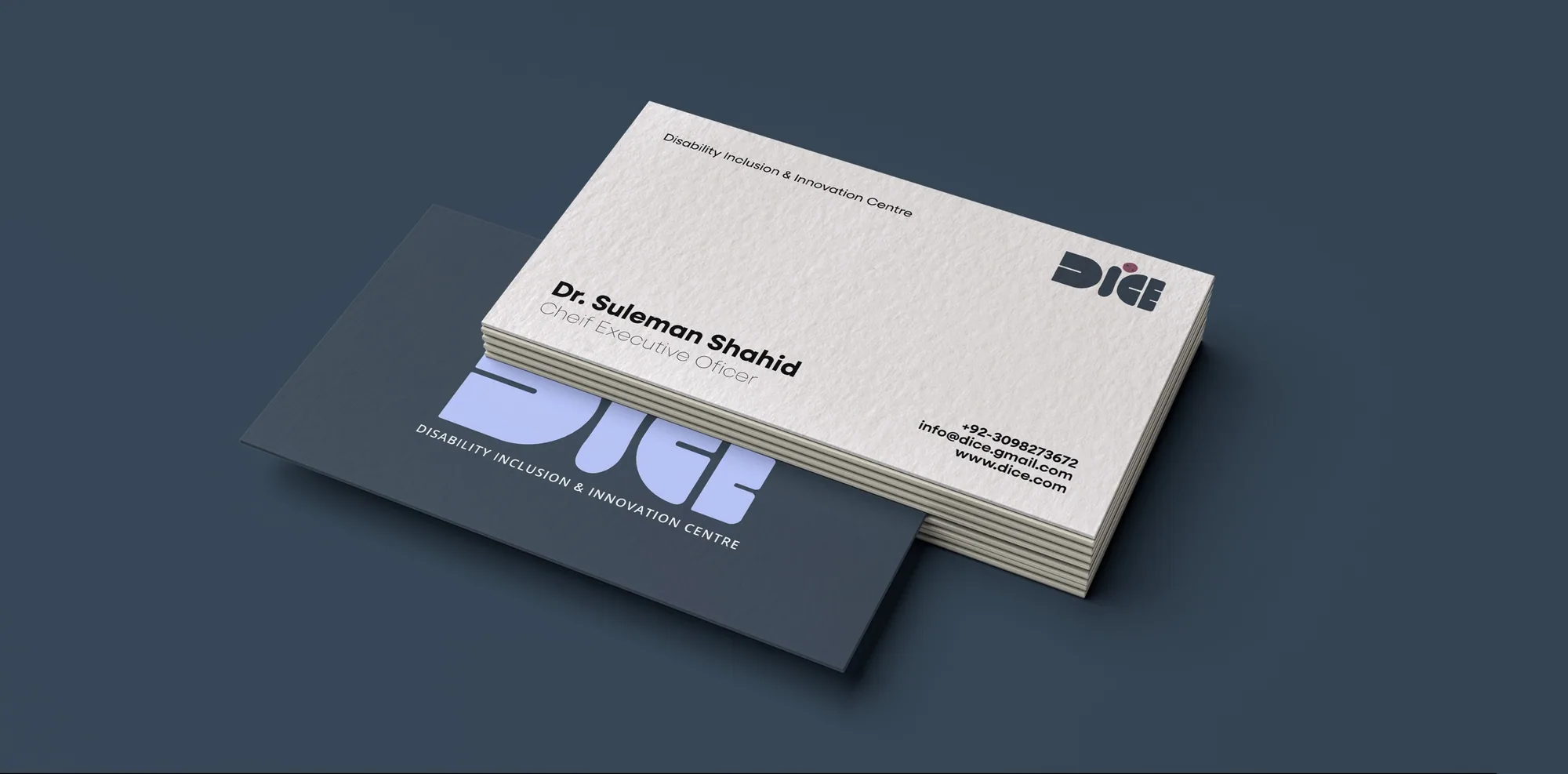 DIICE business cards in periwinkle and white on Payne’s gray