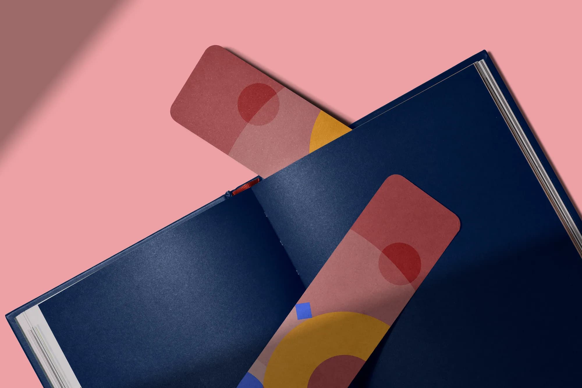 LUMSx bookmarks reading “Self-paced means you can stop here.”, with one tucked into a navy notebook